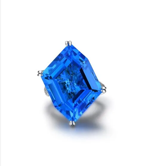 Cocktail Blue Topaz and Diamond Ring